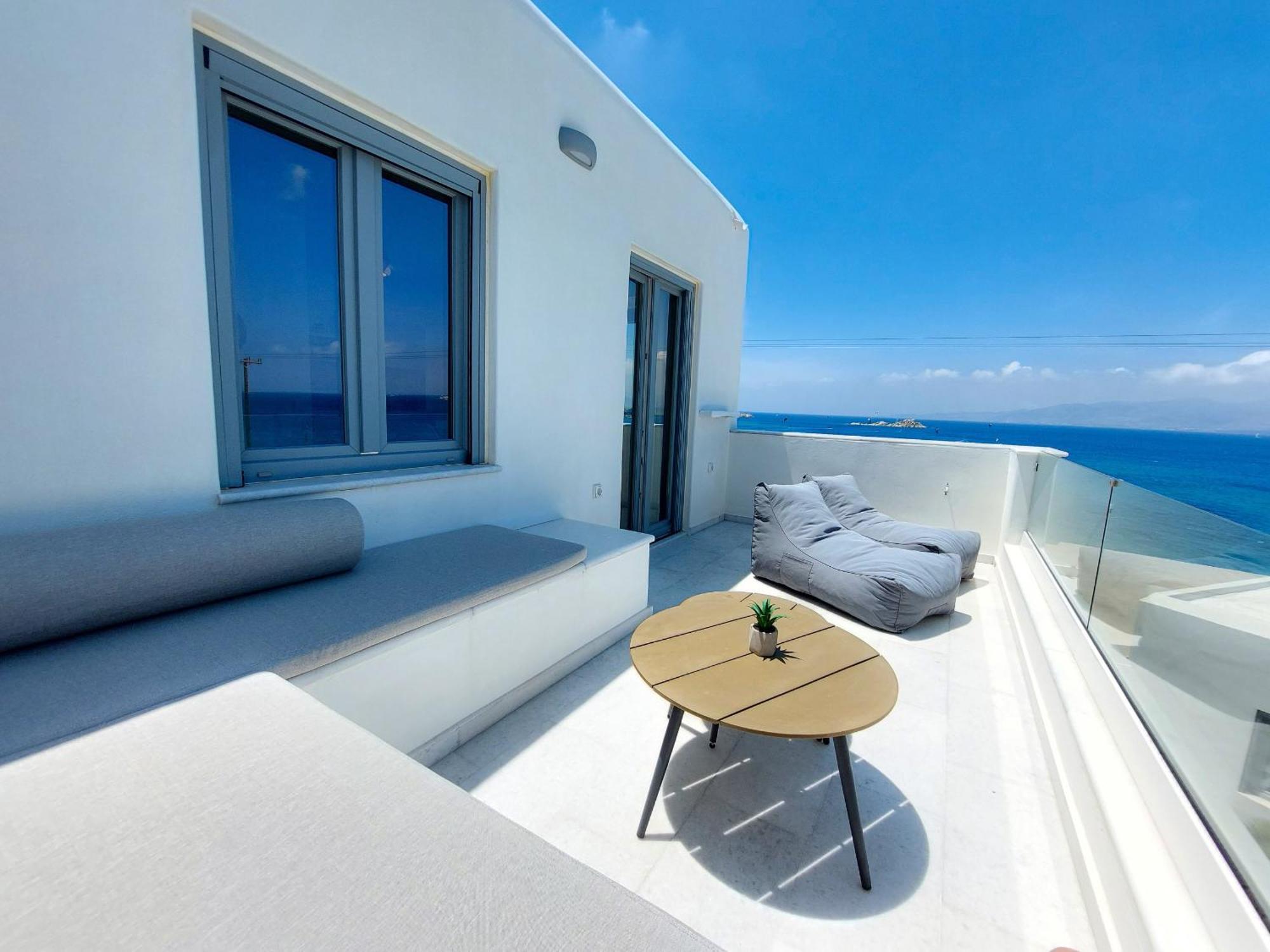 Seanfinity Beachfront Suites Мікрі-Віґла Номер фото