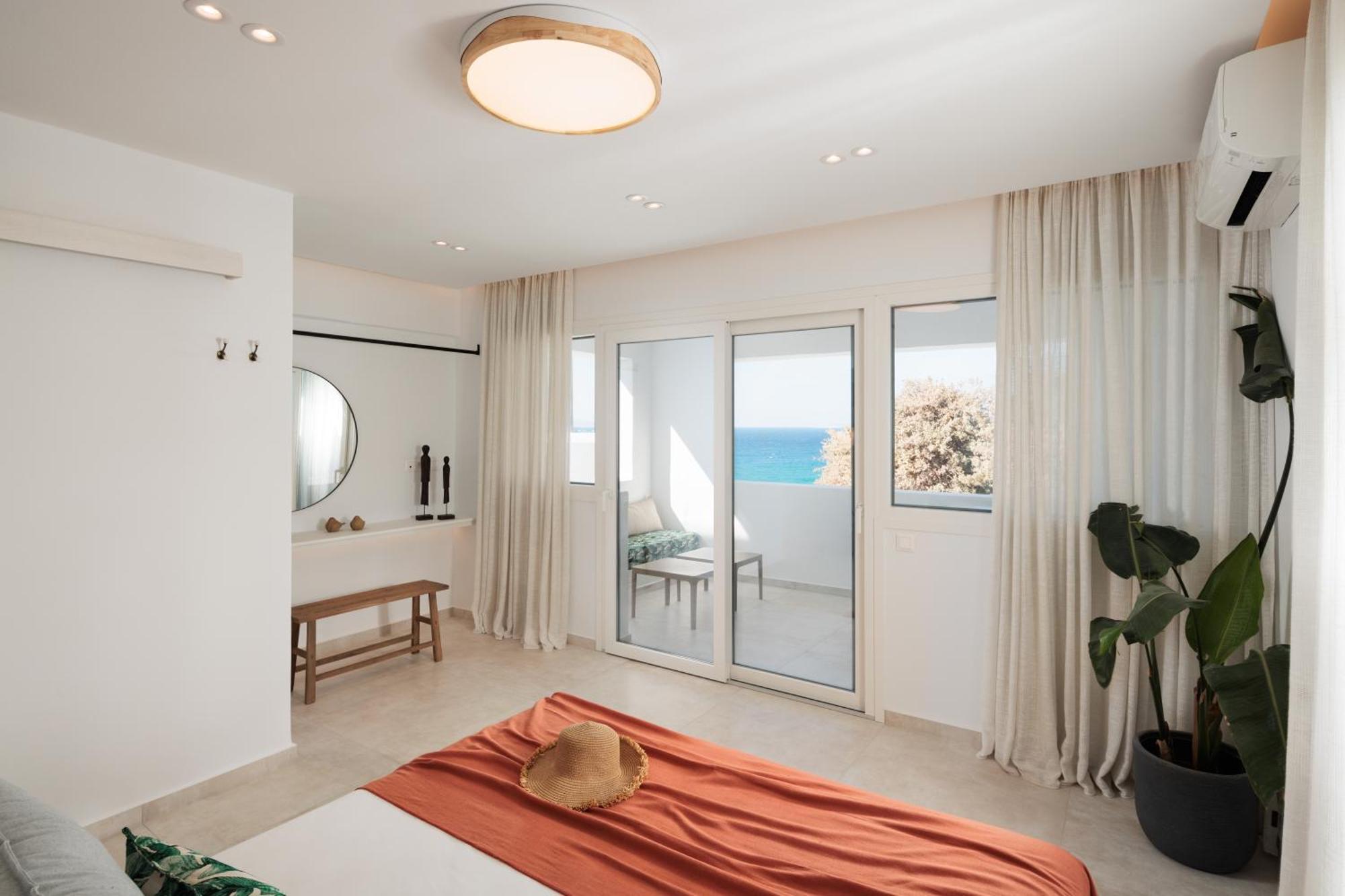 Seanfinity Beachfront Suites Мікрі-Віґла Номер фото